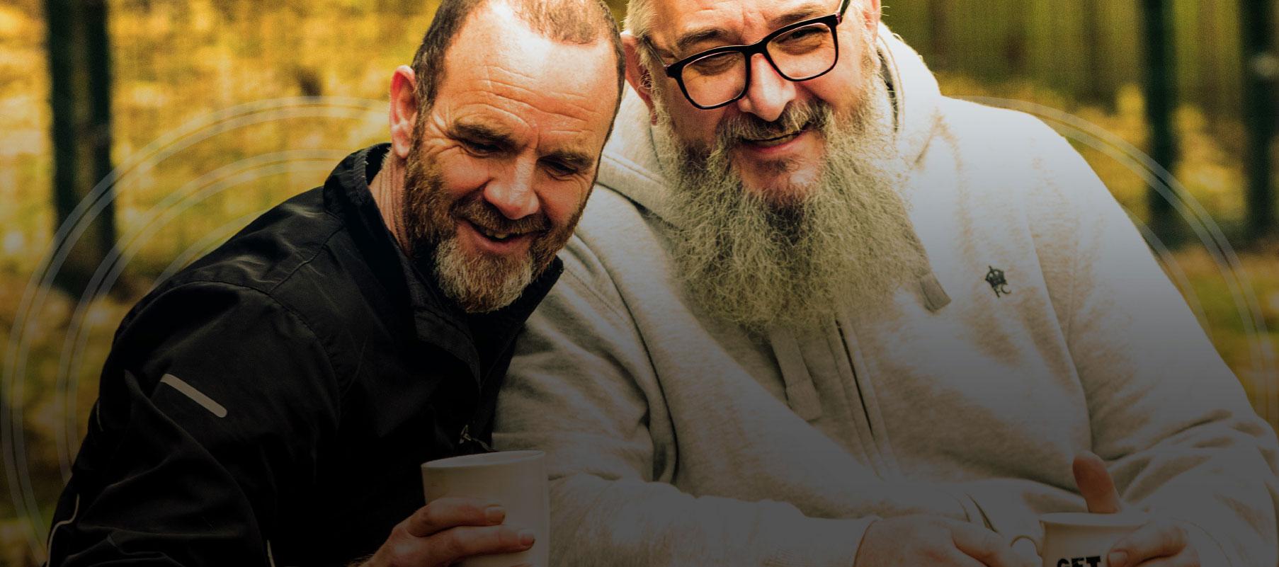 Two men having a cup of tea